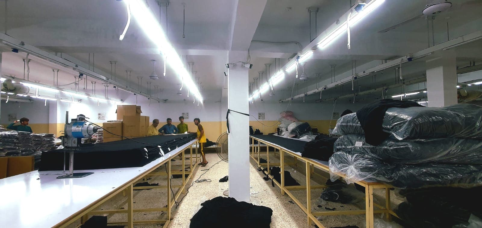 Professional cutting table with precision fabric cutting equipment